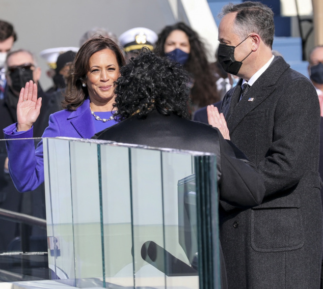 Kamala Harris takes the oath of office as the country's vice president, shattering historical norms.