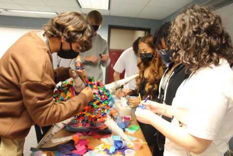 Students in Spanish Heritage class work on a pinata in honor of Hispanic Heritage Month. 