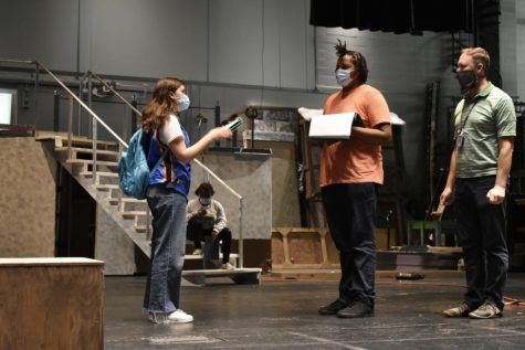 Lauren Molenda and James George rehearse a scene for the upcoming fall play, the Rose and the  Rime. 