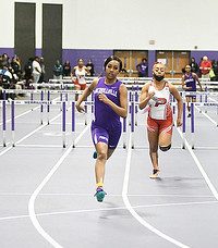 Senior Taylor Jackson competes in the 60-meter hurdles.