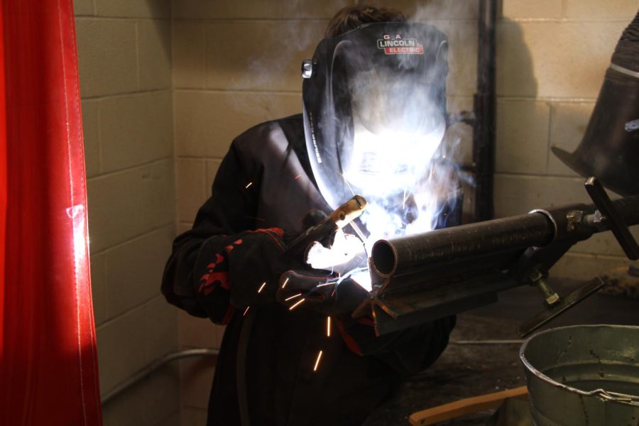 Senior Gaven Karbowski practices his welding skills. 