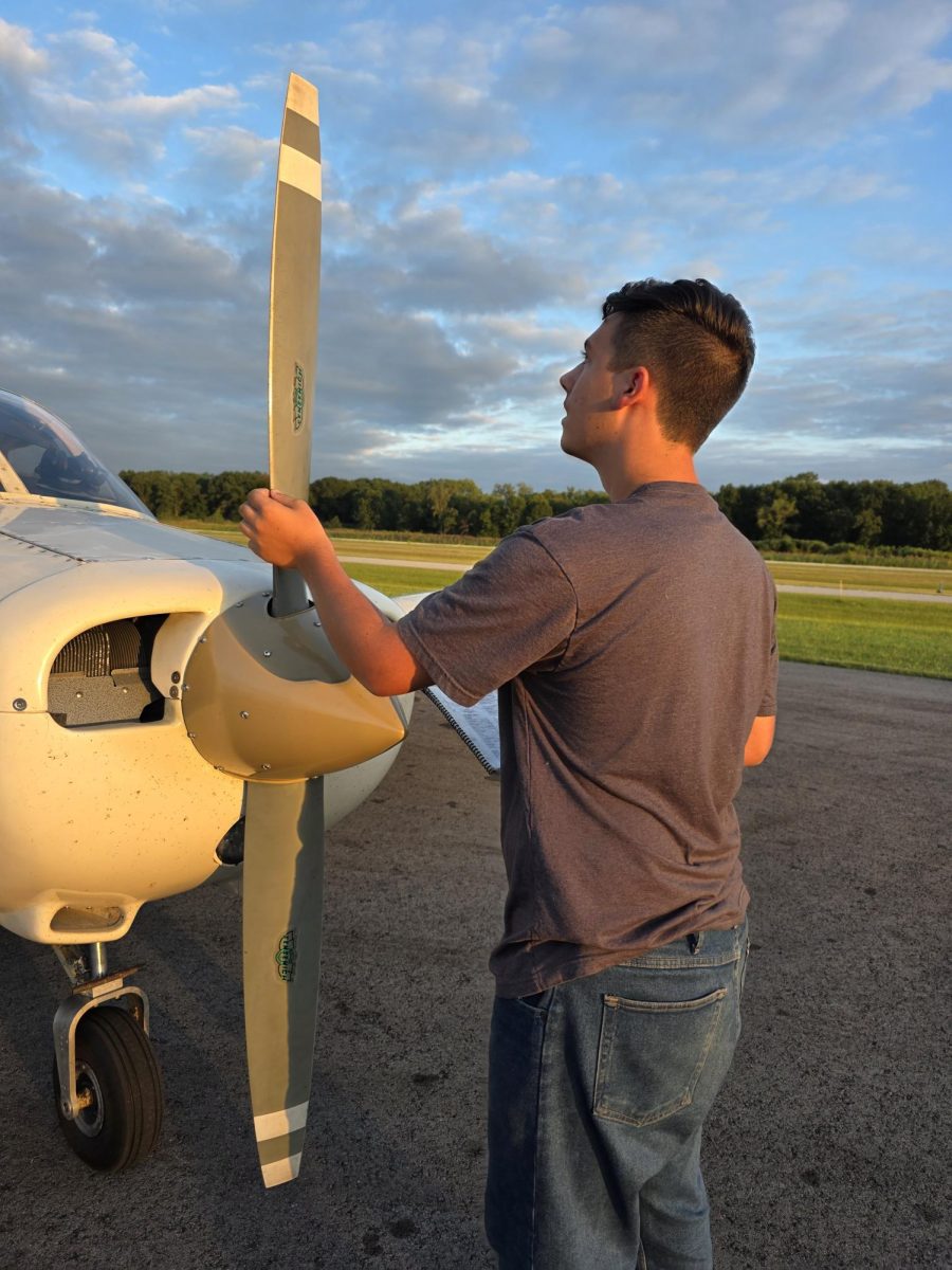 Aydan Gabriel checks out the propeller before a recent flying lesson.