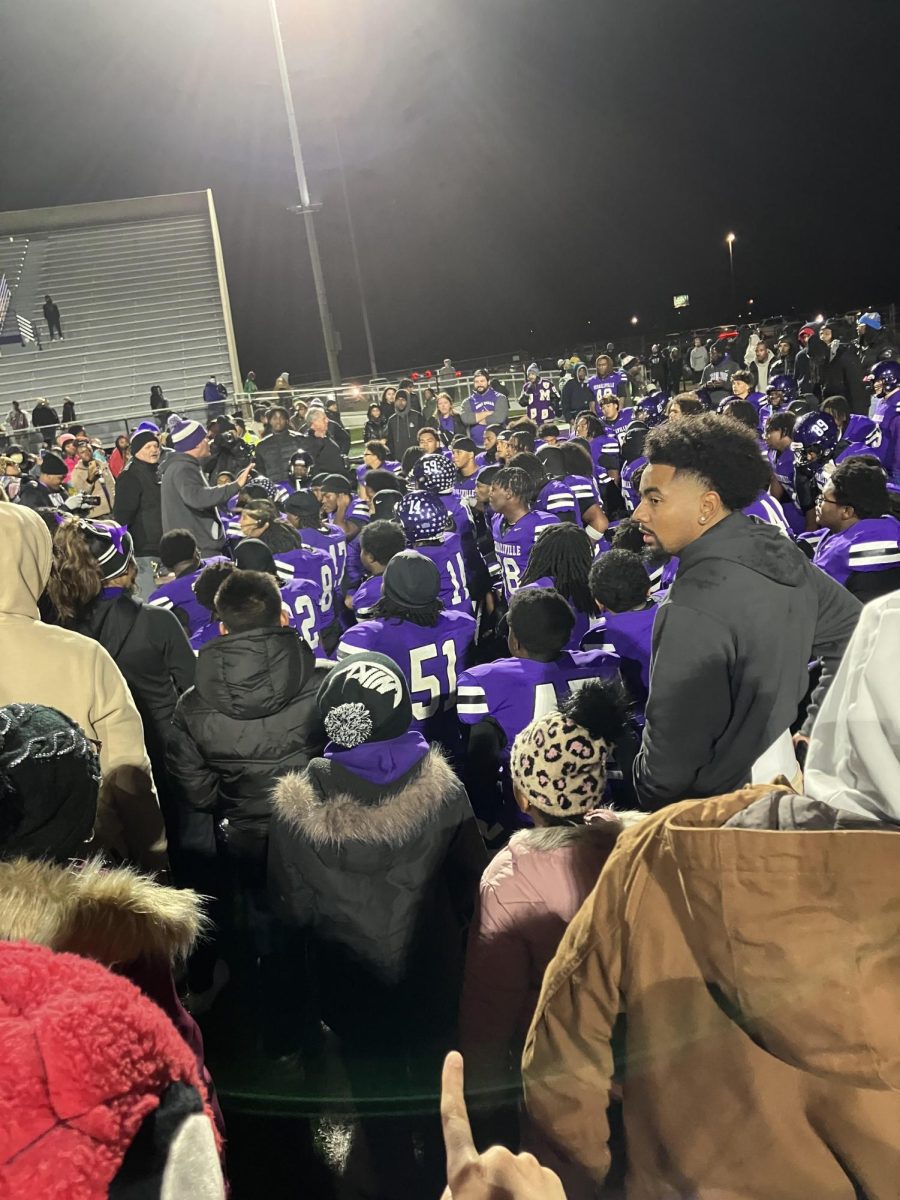 Couch Seiss addresses the team after the Semi-State win over Concord.